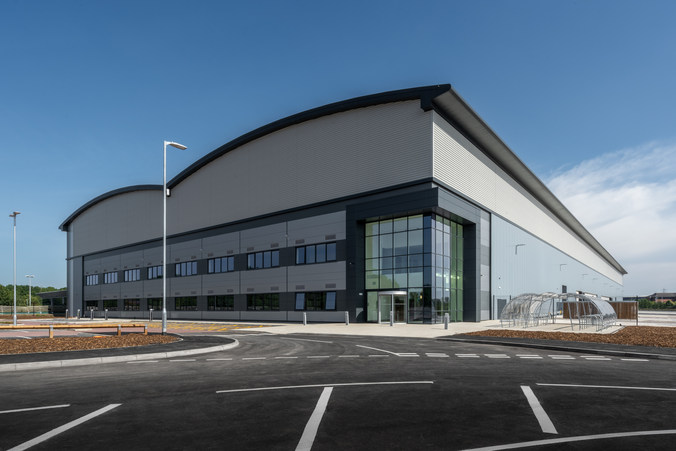 200,000 SQ FT MA6NITUDE UNITS REACH COMPLETION Legat Owen